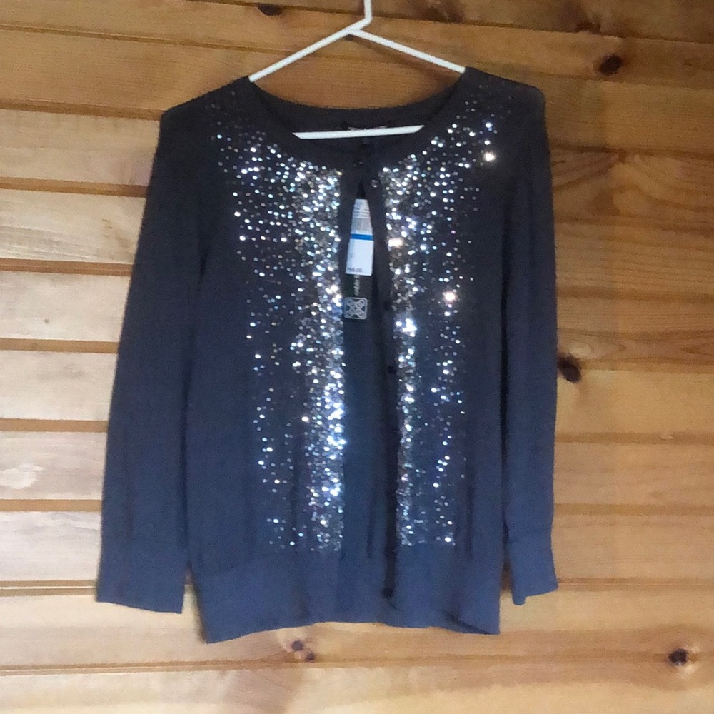 NWT beautiful sparkly cardigan.